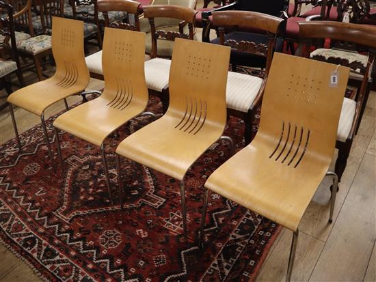 A set of four chrome and plywood chairs